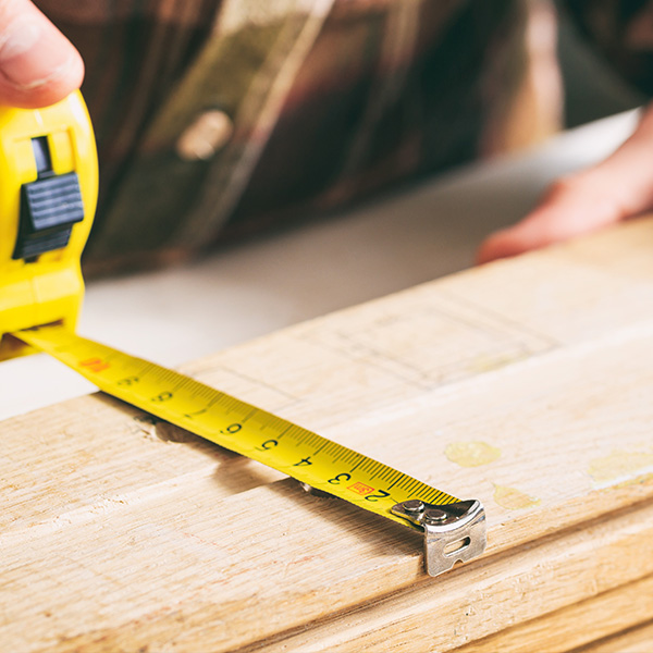 measuring timber boards